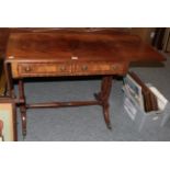 A reproduction mahogany and ebony strung sofa table