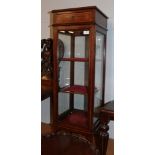 An Edwardian mahogany and satinwood banded display cabinet