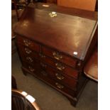 A George III mahogany bureau, fall flap, fitted interior, two short over three long graduated