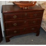 An 18th century walnut three-height chest of drawers