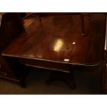 An early Victorian mahogany pedestal sofa table