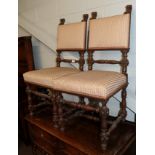 A pair of Gothic hall chairs with lion terminals