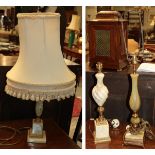 Three decorative lamps comprising a green onyx example with metal mounts, an alabaster urn shaped