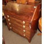 A George III mahogany bureau with fitted interior