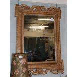 A reproduction Italian decorative wall mirror
