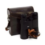 Leitz Trinovid Binoculars 10x40, 122m/1000m no.650454, in manufacturers leather caseOptics appear to