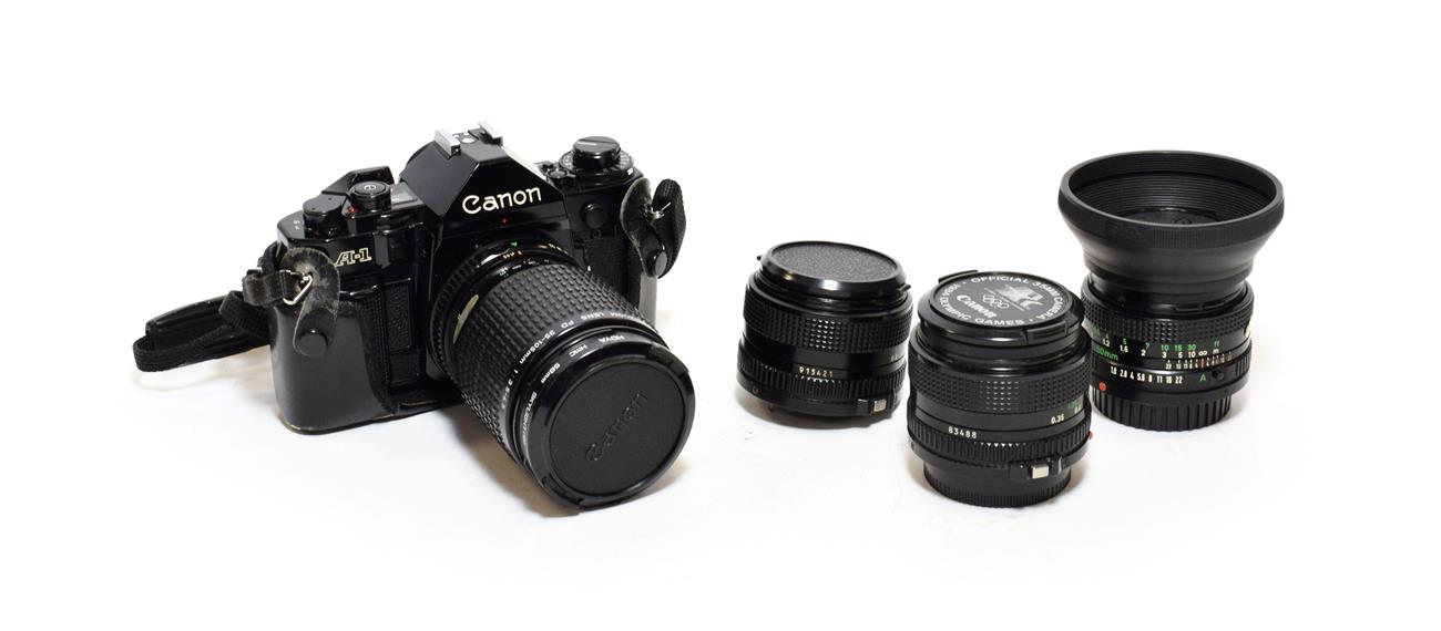 Canon A1 Camera no.2064443, with FD lenses: f3.5-4.5 35-105mm, f2.8 35mm, f2.8 28mm and f1.8 50mm