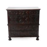 A Late 17th Century Joined Oak Chest, in two parts, with four straight front geometric and moulded