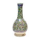A Persian Faience Bottle Vase, 19th century, of ovoid form with cylindrical neck, painted in blue,