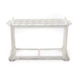 A Victorian Style Cast Metal and Painted Stick Stand, the rectangular top with twenty-four