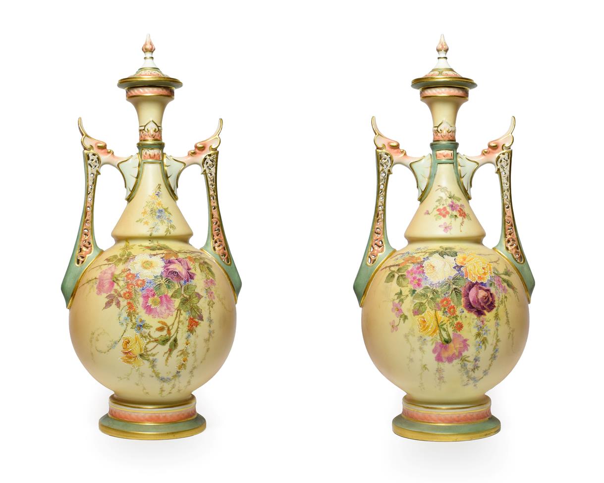 A Pair of Royal Worcester Porcelain Vases and Covers, circa 1905, of baluster form with pierced