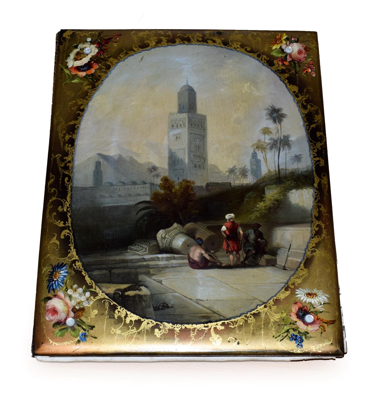 A Victorian Papier Mâché Desk Blotter, 19th century, of rectangular form, the cover painted with