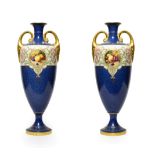 A Pair of Royal Worcester Porcelain Vases, by Horace Price, 1921, of urn shape with twin scroll