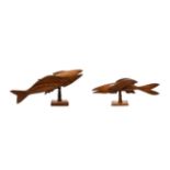 A Pitcairn Island Carved Wooden Model of a Flying Fish, mid 20th century, on a baluster stem and