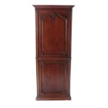A French Walnut Cupboard, circa 1870, with two cupboard doors, the upper section enclosing a blue