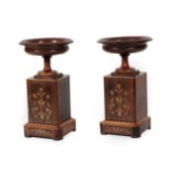 A Pair of Regency Style Rosewood and Marquetry Urns, of campana form centred by roundels, on