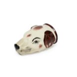 A Staffordshire Pottery Hound's Head Stirrup Cup, mid 19th century, naturalistically modelled and