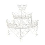 A Victorian Painted Wirework Plant Stand, of three-tier graduated form, 107cm by 57cm by 106cm