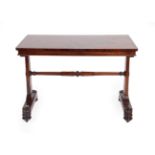 A William IV Rosewood Pillar-End Writing Table by T&G Seddon, circa 1840, of rectangular form with