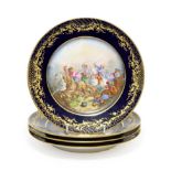 A Set of Four Sèvres Style Porcelain Cabinet Plates, late 19th/early 20th century, painted with