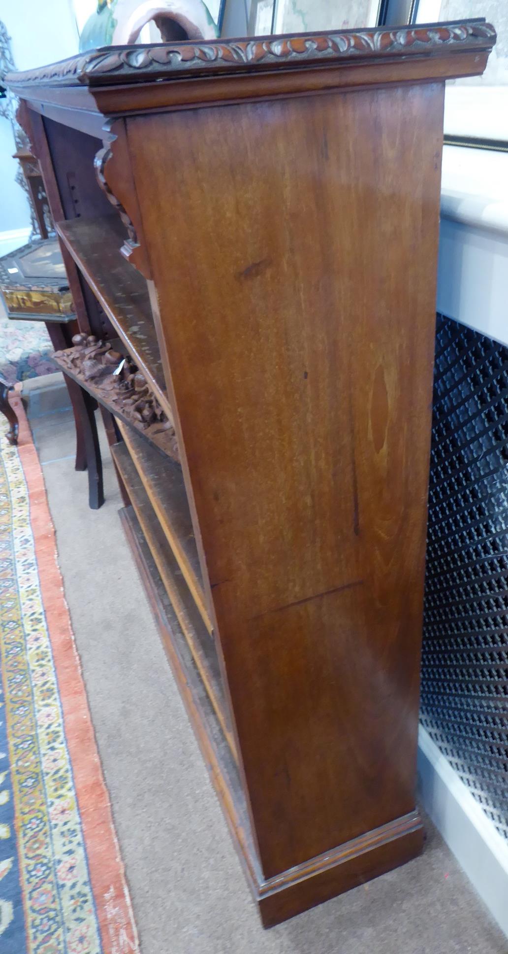 A Victorian Carved Walnut Free-Standing Open Bookcase, labelled James Shoolbred, Tottenham Court, - Image 7 of 7