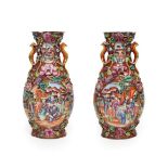 A Pair of Chinese Porcelain Baluster Vases, Qianlong, painted in the Mandarin palette with figures