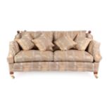 A Duresta Two-Seater Sofa, modern, batch ID number 227030, covered in cream and gold striped