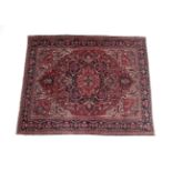 Heriz Carpet of unusual size North West Iran, circa 1920 The brick red field with typical salmon