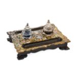 A Victorian Papier Mache Desk Standish, of ogee rectangular form with two hexagonal ink bottles