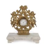 A Gilt Metal Desk Timepiece, early 20th century, gilt metal cast cherub case, marble base, enamel