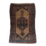 Sarab Rug North West Iran, circa 1920 The plain camel ground centred by a medallion framed by