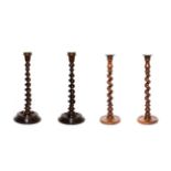 A Pair of Victorian Turned Wood Candlesticks, with urn sconces, barleytwist columns and turned