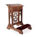 A Victorian Gothic Revival Small Oak Lectern, in the manner of Pugin, the hinged lid above tracery
