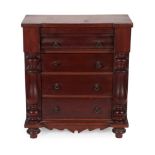 A Victorian Mahogany Inverted Breakfront Miniature Chest of Drawers, with bombé frieze drawer over