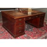 A Victorian Mahogany Partners' Desk, late 19th century, in George III style, with an inset brown