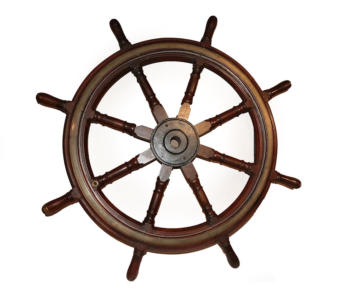 A Brass Bound Mahogany Ship's Wheel, 19th century, with iron boss and eight baluster turned