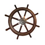 A Brass Bound Mahogany Ship's Wheel, 19th century, with iron boss and eight baluster turned