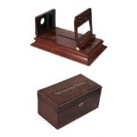 A Negretti & Zambra Mahogany Stereoscopic Viewer, the cardholder with foliate fret piercing, on a