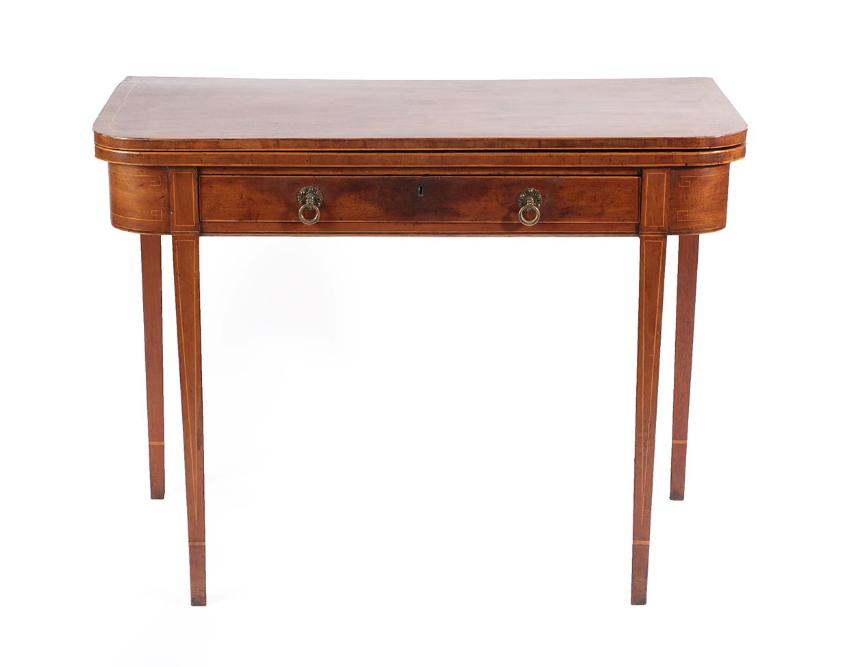 A George III Mahogany and Boxwood Strung Foldover Tea Table, late 18th century, with single frieze