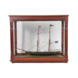 A Painted Wooden Scale Model of the Mizpah, late 19th/early 20th century, as a two-masted boat, in a