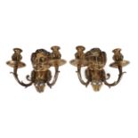 A Pair of Cast Brass Twin-Light Wall Lights, in 17th century style, with Bacchic masks issuing