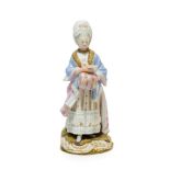 A Meissen Porcelain Figure of the Racegoer's Companion, circa 1900, standing wearing a lace-