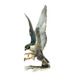 A Hutschenreuther Peregrine Falcon, late 20th century, naturalistically modelled and painted with