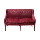 A George III Style Feather-Filled Two-Seater Sofa, covered in dark pink cut velvet, with two squab
