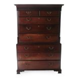 A George III Mahogany Chest on Chest, late 18th century, the dentil cornice above a blind fret