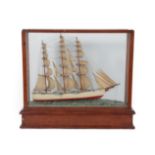 A Painted Wood Scale Model of a Three-Masted Sailing Ship, early 20th century, in a glazed