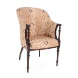 A Victorian Carved Mahogany Armchair, late 19th century, recovered in modern cream and gold floral