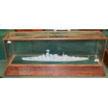 A Scale Model of HMS Hood, in a glazed oak display cabinet, 100cm wide overall