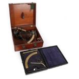 A Brass and Patinated Sextant, 20th century, 24cm, in a brass mounted mahogany case; and A J