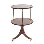 A George III Mahogany Two-Tier Revolving Whatnot, early 19th century, of dished circular form with